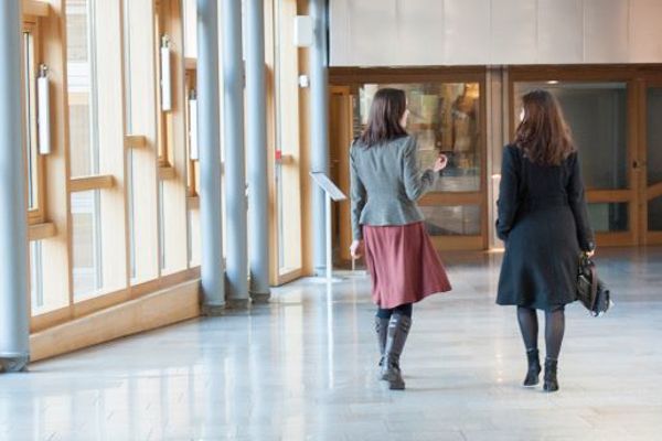 Women walking down corridor in Scottish parliament building