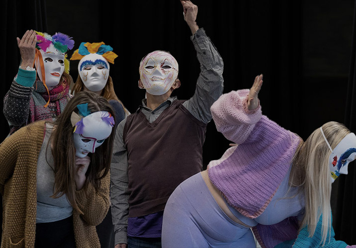 Drama Therapy students performing in masks