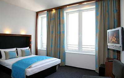 Bedroom at Motel One Edinburgh Royal Mile