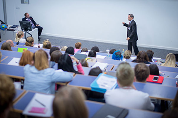 Queen Margaret University Events Management students listening to a talk in a lecture theatre