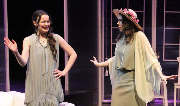 Two Queen Margaret University students acting on stage