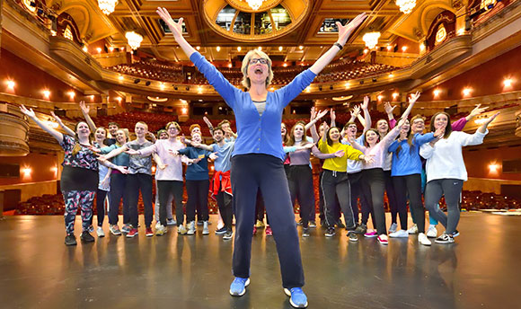 QMU students performing on stage at Edinburgh Festival Theatre