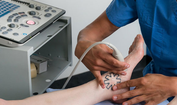 A close up of someone receiving podiatry treatment.
