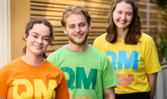 Smiling student helpers at a QMU Open Day