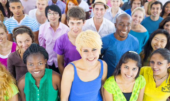 A group of young people looking directly at the camera