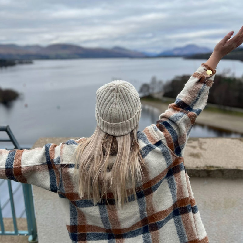 A photo of Essi taken from behind while on her trip to Loch Lomond