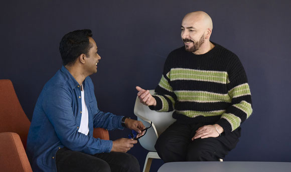 A student speaking to a member of the Student Services team.