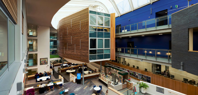 A wide shot of the interior of the QMU atrium