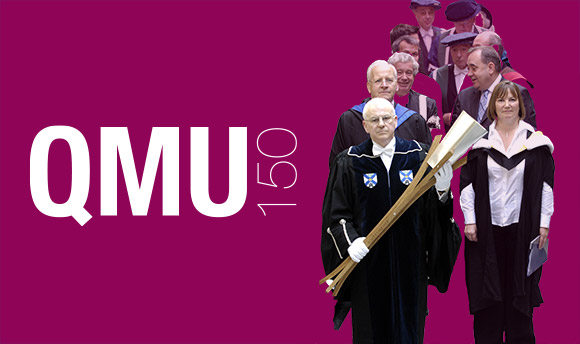 A standard banner with the QMU Logo and the text "QMU150" alongside a group of people in procession, one holding the university mace.