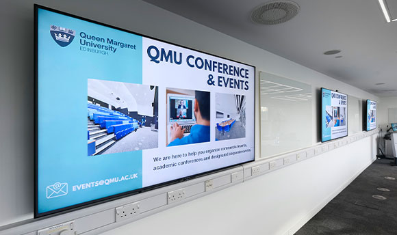 A close up of the screens in the Conference Suite at Queen Margaret University, Edinburgh