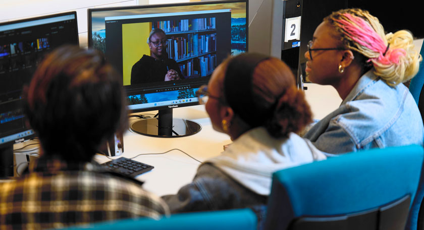 Students using video editing equipment