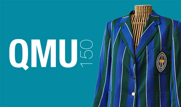 A standard banner with the QMU Logo and the text "QMU150" alongside a mannequin wearing the QMU blazer.