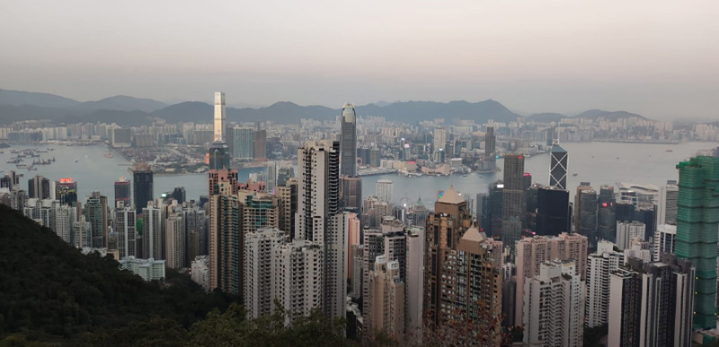 An aerial view of Hong Kong, the landscape filled with skyscrapers.