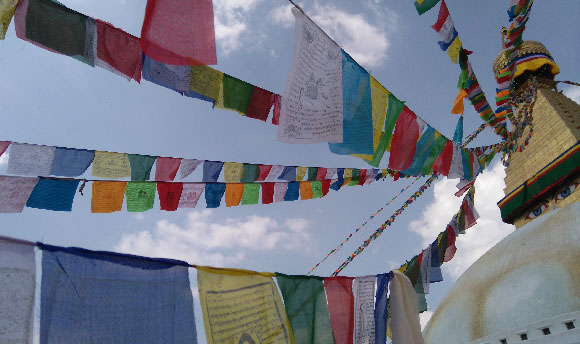 Rows and rows of prayer flags in every colour