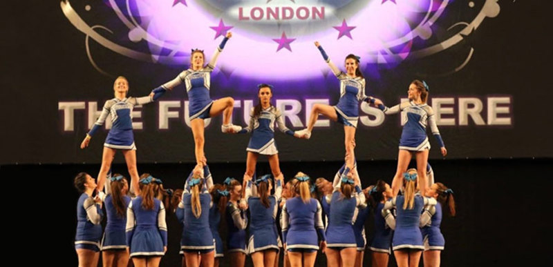 QMU Sapphires Cheerleading squad performing at an event in London